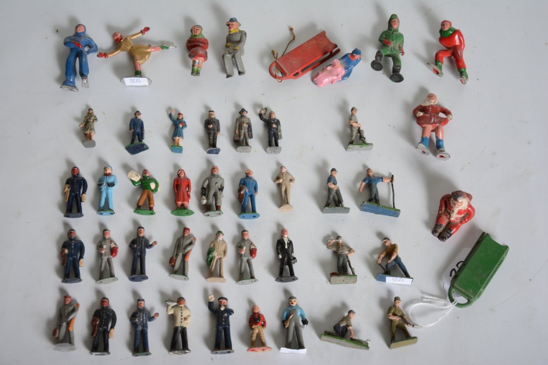 Vintage Figure Lot: Dimestores include Barclay Santa on sled; Boy pulling kids on sled and 5 others; 18 small size Barclay figures; 12 Authenticast figures, all marked Erie with square bases. 1 American Flyer round base 