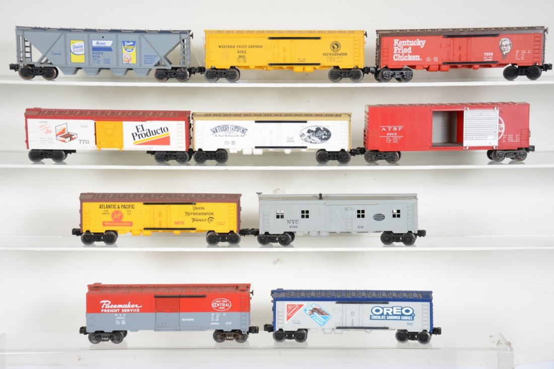 Lionel Modern Freight Cars: Includes 9116 domino hopper; 9819 WFE reefer; 7509 Kentucky Fried reefer; 7711 El Producto reefer; 9834 Southern Comfort reefer; 9875 A&P reefer; 9602 SF Hi Cube; 5735 bunk car; 9469 NYC Standard O bo