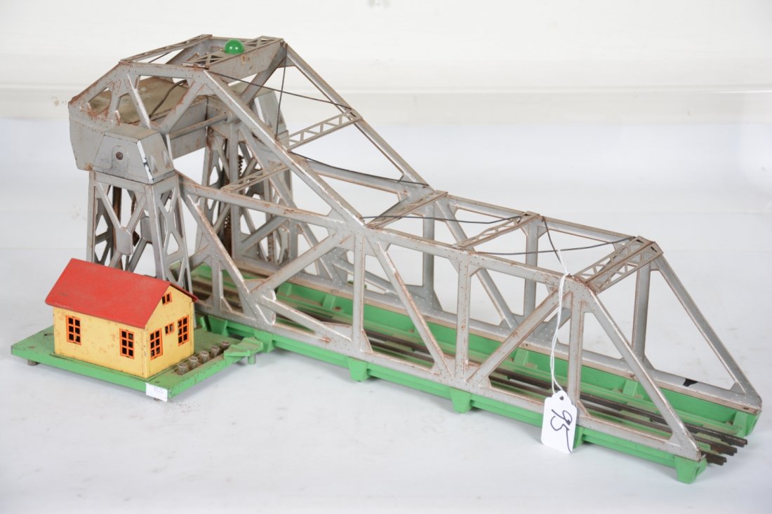Lionel 313, 364 & 456 Accessories: Includes a 313 Bascule bridge. Base is fairly straight with some oxidation on silver parts. 1 top brace is loose; 456 coal ramp only, replaced handrails; 364 lumber loader. All show moderate to heavy 