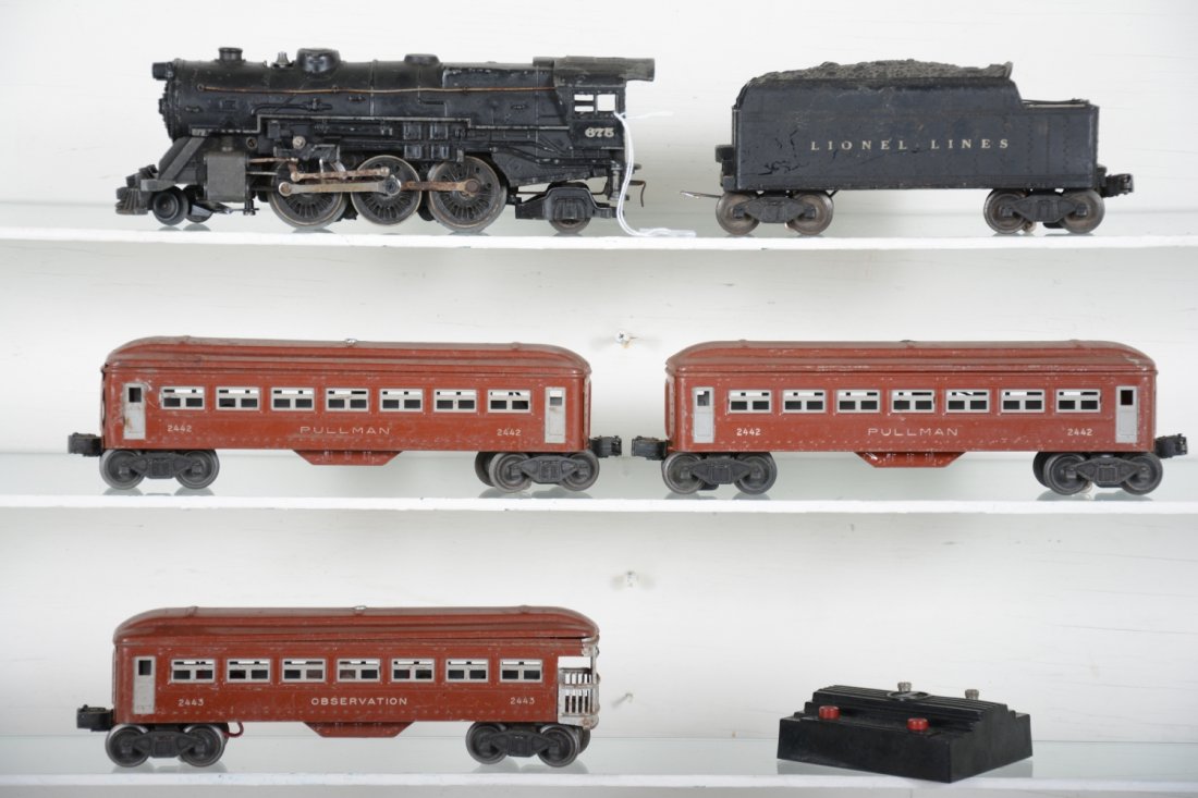 1947 Lionel 675 Set (2120W): Includes a 675 O gauge steam loco. It has a slight bend to cab corner & replaced boiler front; 2466W tender; 2 #2443 Pullmans; 2443 observation. All could use a cleaning, but only shows moderate playw