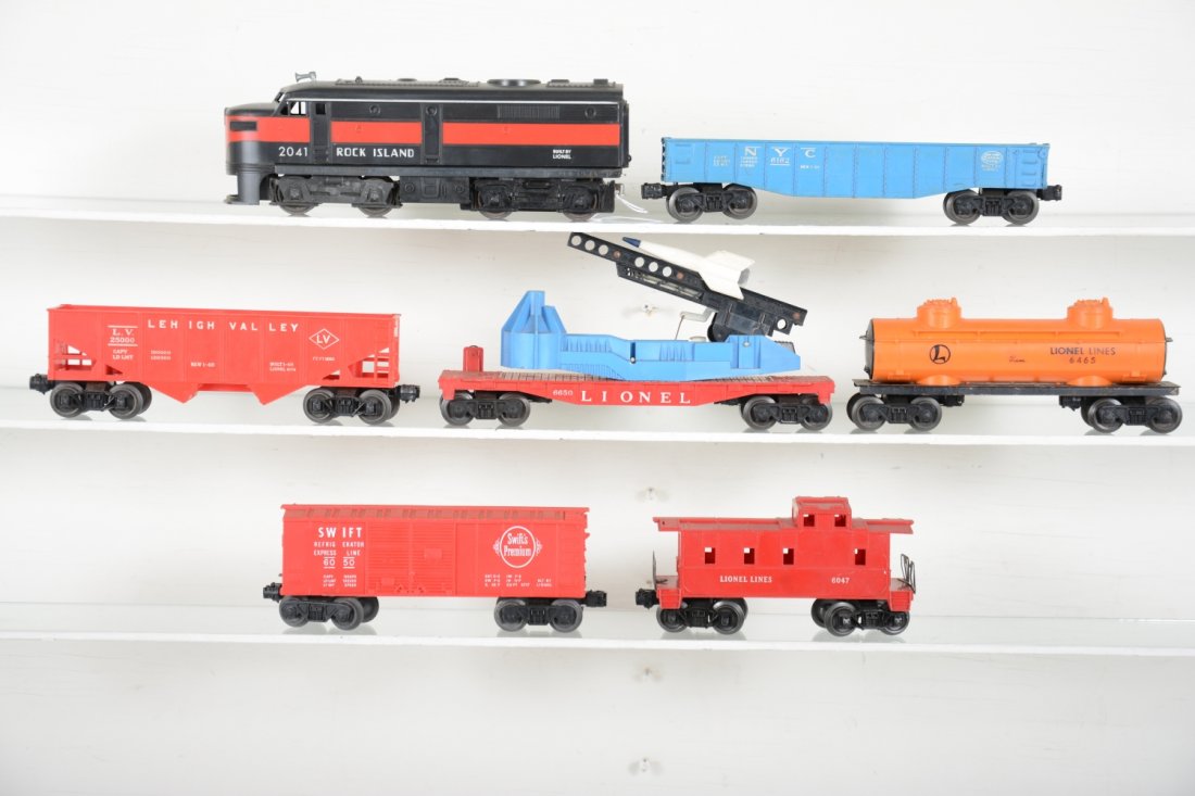 Lionel 2041 Diesel Freight Set: Includes a 2041 RI Alco A diesel, power frame is from a 221, cowl intact; 6162 gondola; 6050 Swift's bank car; 6465 tank car; 6076 hopper; 6650 missile launcher with 1/2 missile; 6047 caboose. Rest sh