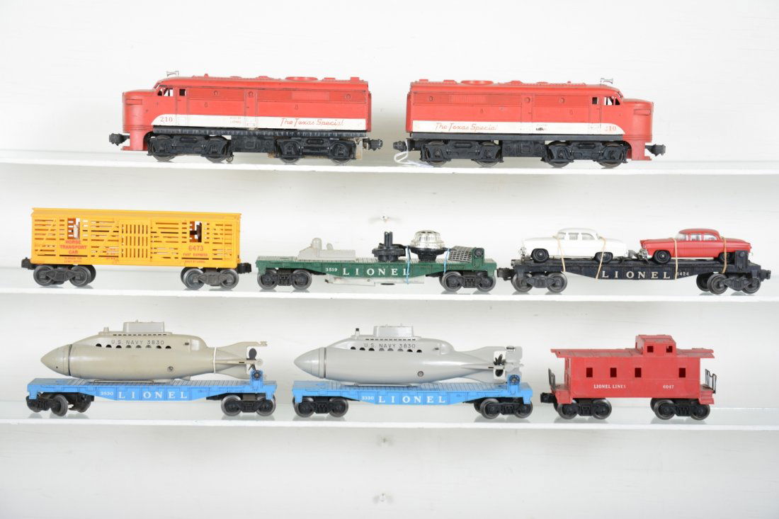 Lionel 210 TS Double Diesel Freight Set: Includes a 210 Texas Special Alco AA diesels, dummy has broken cowl; 3519 satellite launcher, missing dish, satellite incomplete; 3830 flat with broken sub; 3330 flat with reproduction sub; 6424 auto-