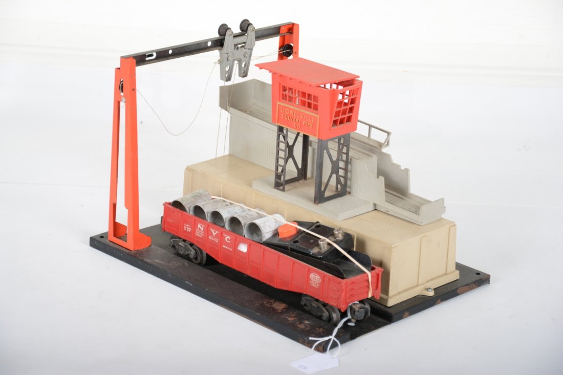 Lionel 345 Culvert Unloader: Clean with 6342 gondola with 5 culverts #90c controller, missing roof & counter weight. It is fairly clean, showing light to moderate playwear, C7