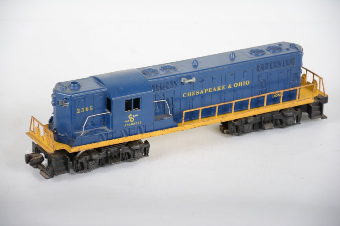 Lionel 2365 C&O GP7 Diesel: Intact shell with frame, showing heavy playwear. It shows moderate runtime, C5+-6 ish