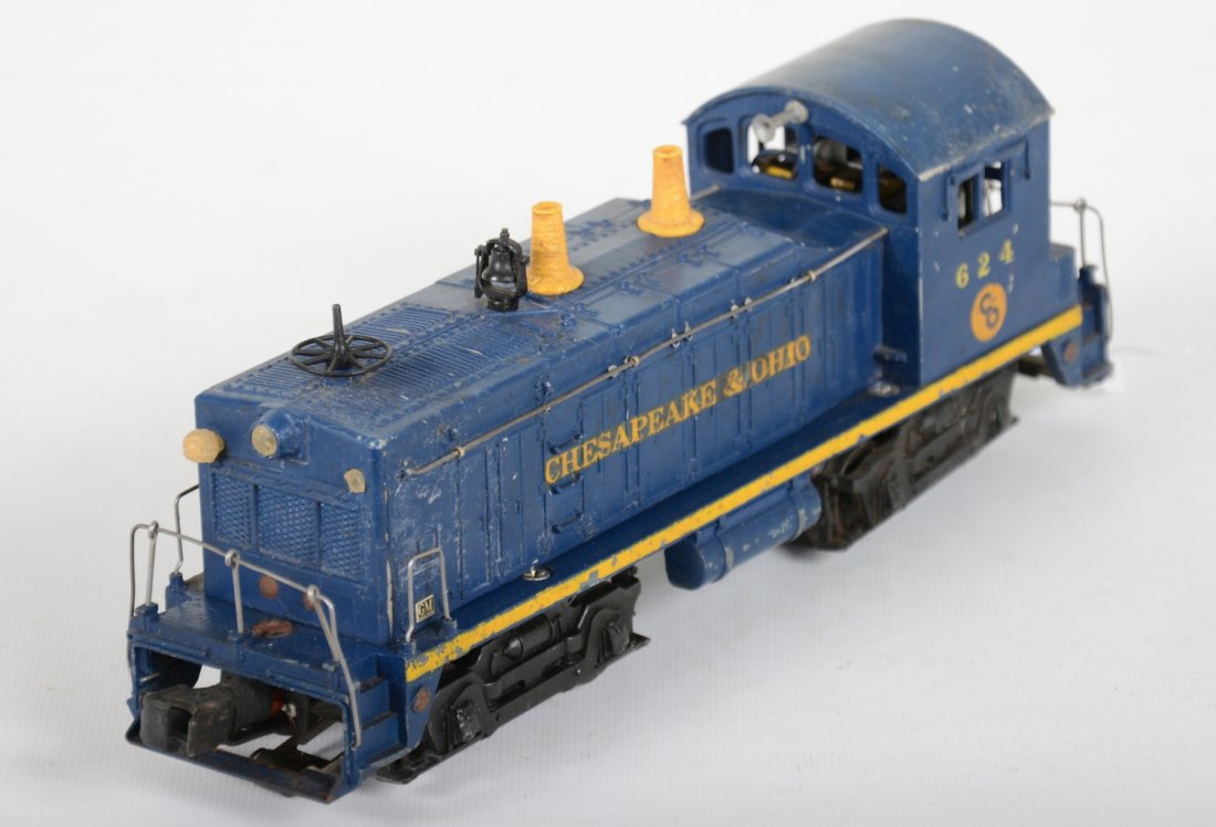 Lionel 624 C&O NW2 Diesel: Great pulling diesel. This example has 95% side decals and shows moderate over-all playwear, roof appears to be touched-up, C6-