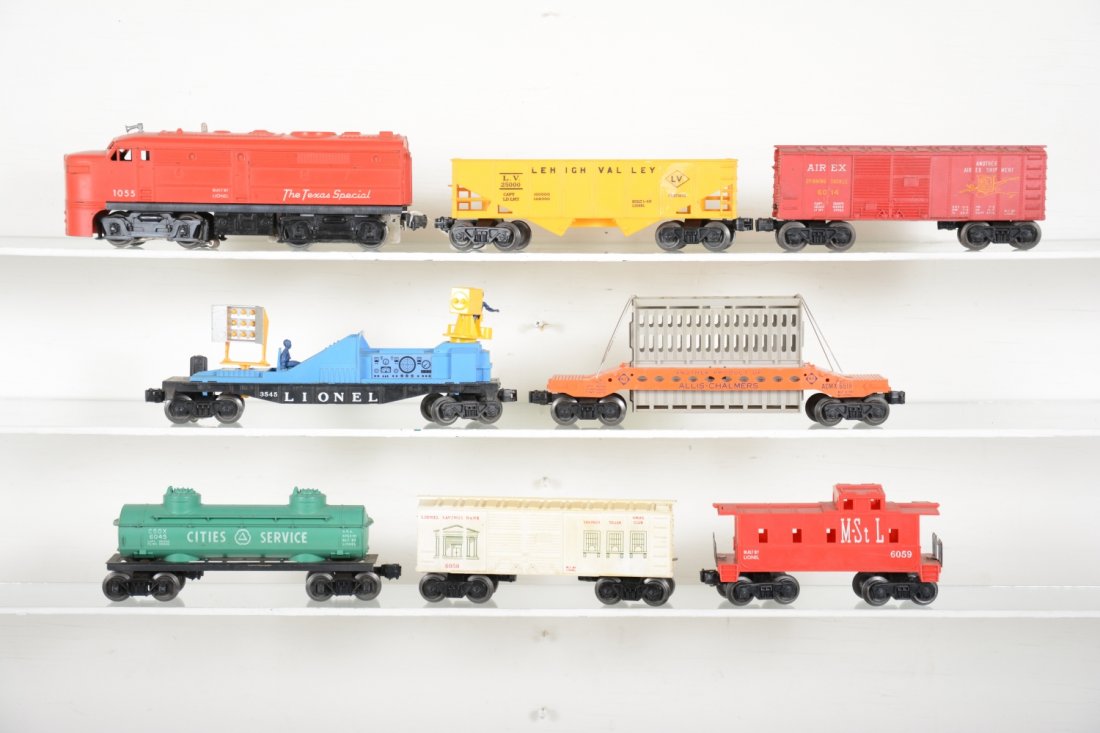 Lionel 1055 Diesel Freight Set: Includes a 1055 TX Alco A Diesel, added reverse unit; (6176) LV hopper; 6014 Airex boxcar; 3545 TV car, replaced camera unit; 6519 Allis-Challmers car, AS-IS; 6045 CS tank car; 6050 savings bank car, 