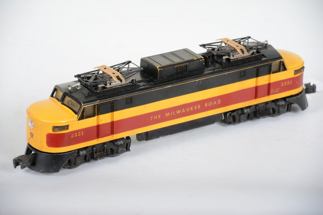 Lionel 2351 MR EP-5 Electric: Clean shell with rivet cracks both sides. Frame has some battery damage, no bracket inside. Overall shows moderate playwear, appears C6 ish(C4 with damage)