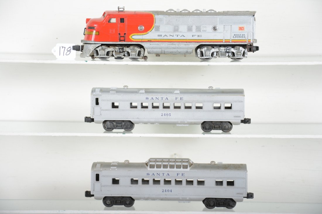 Lionel SF Diesel Passenger Set: Includes a 2333 SF F3 A powered diesel, oxidation on battery bracket inside; 2404 SF vista-dome; 2405 SF coach. All show moderate to heavy playwear, C5