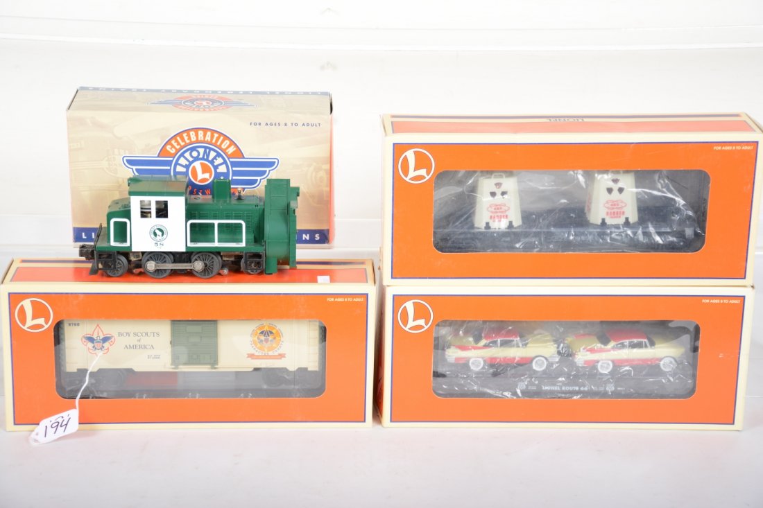 Lionel Lot: celebration 18446 RG rotary snow plow; 26237 Boy Scouts boxcar; 17536 Rt 66 flat with autos; 36006 flat with uranium canisters. All show light runtime with C9 bodies with boxes.