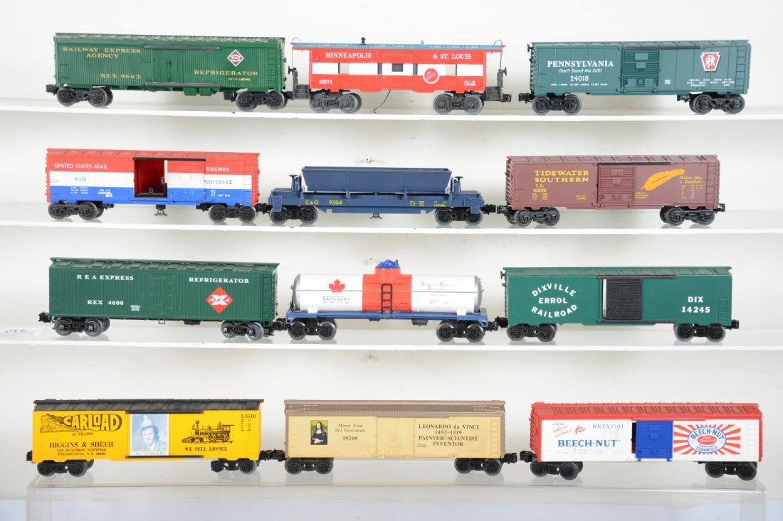 Modern Freight Cars: Includes Lionel 24018 PRR Boxcar; 9863 REA reefer; 9301 USPS oper boxcar, incomplete; 9271 M&StL caboose; 9304 coal dump; 19201 TS boxcar; 7703 Beechnut reefer; 19508 DiVinci reefer; KMT Carload boxca