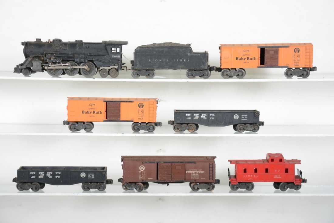 Lionel 2025 Steam Freight Set: Includes a 2025 steam loco, missing 1 handrail and running light; 2466WX tender, small crack near step 1 side; 2 #2454 BR boxcars; 2 #2452 PRR gondolas; 2458 PRR boxcar; 2257 caboose. All need a clean