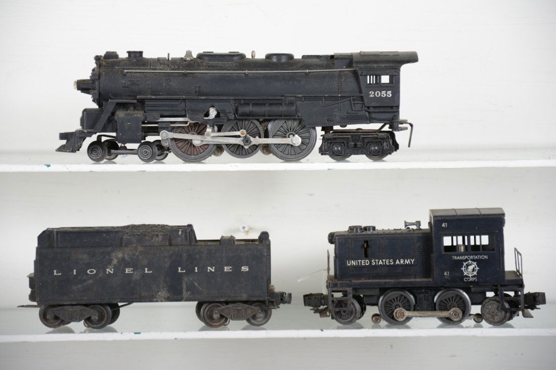 Lionel 41 & 2055 Powered Units: Includes a 2055 4-6-4 steam loco, slight bend to 1 small front step; 6026W tender, 1 broken step, some oxidation on frame; 41 US Army diesel, missing 1 handrail, 1 hairline crack to strut 1 side. Both