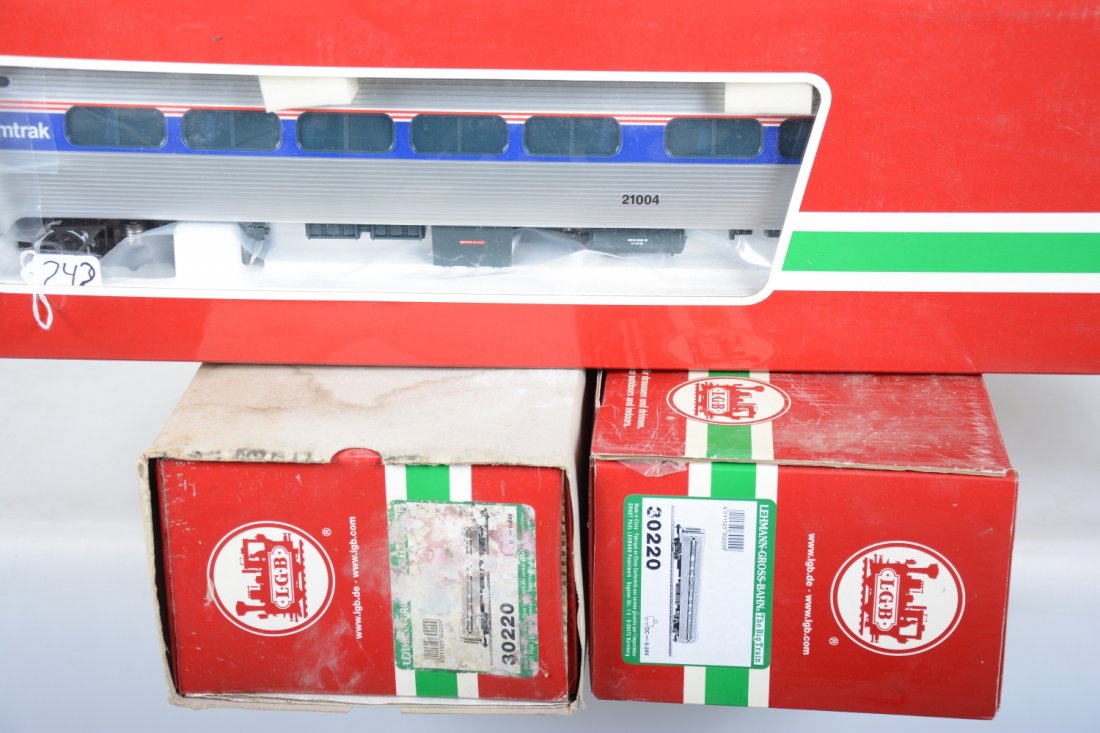 LGB Amtrak Metroliner Cars: Includes 2 #30220 coaches and a 32220 coach. They are 29" long and show light playwear with boxes, 1 worn. Cars are C8