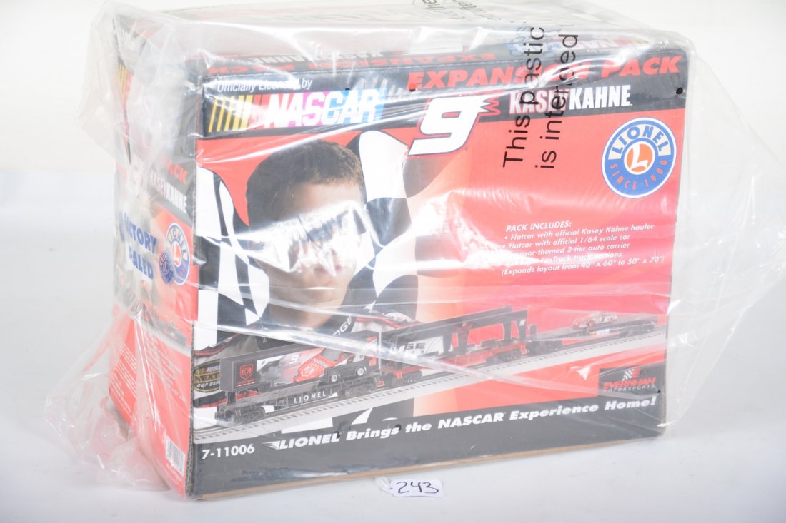 3 Lionel 11006 Nascar Expansion Sets: Each is a 3-car set with Kasey Kahne hauler; flat with 1/64 scale race car; 2-tier auto-carrier; 4 straight tracks. All 3 are new in boxes with shippers, C10
