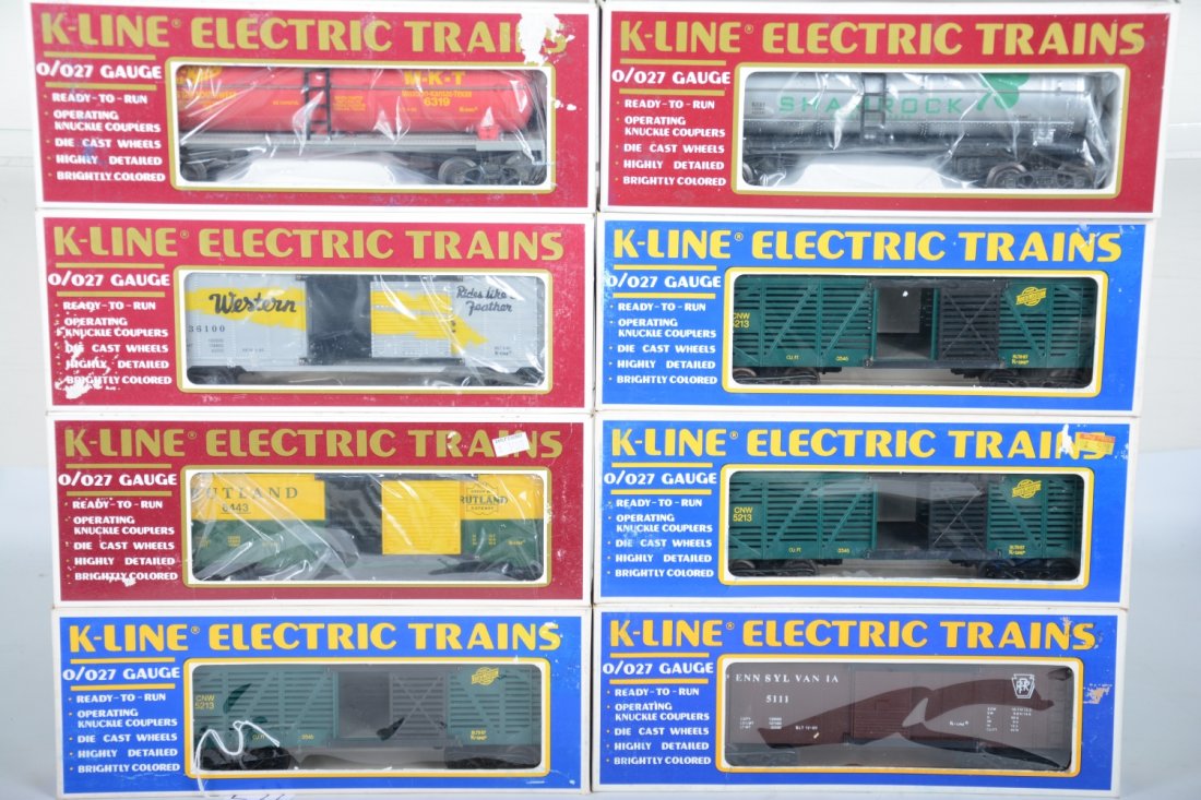 K-Line Freight Cars: Includes 5111 PRR boxcar; 6331 Shamrock tank car; 6443 Rutland boxcar; 3 #5213 C&N stock cars; 6318 MKT tank car; 6436 WP boxcar. All appear new in boxes, C9-10