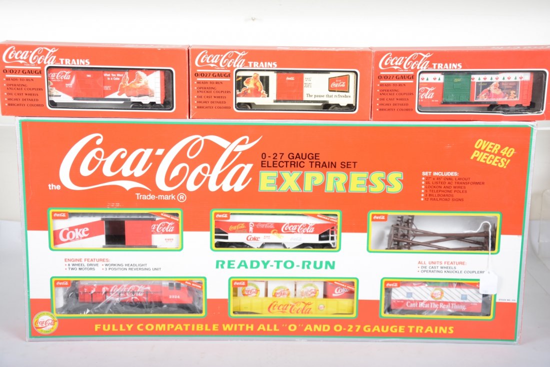 K-Line Coca-Cola Train Set: Includes the 1111 set with a diesel loco boxcar, hopper, gondola with Coke crates and caboose, telephone poles track & transformer; Plus 3 additional Coke history boxcars. All show light runtime with