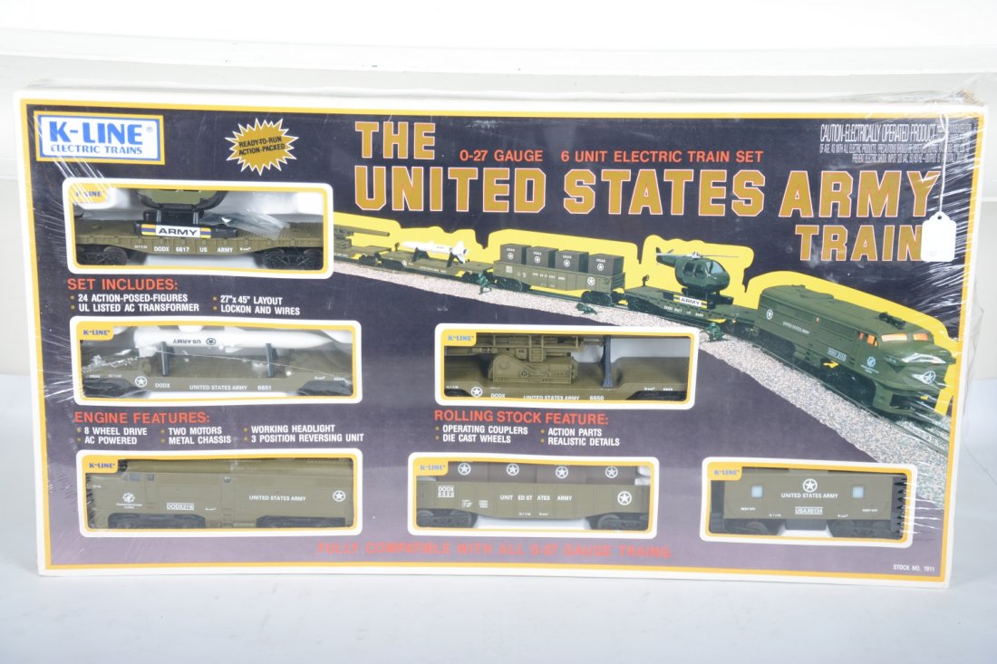 Mint K-Line 1911 US Army Train Set: Nice military set with an Alco diesel, flat with helicopter; flat with missile; Big bertha cannon; gondola with crates and caboose, 24 figures, track & transformer, all sealed in setbox, C10