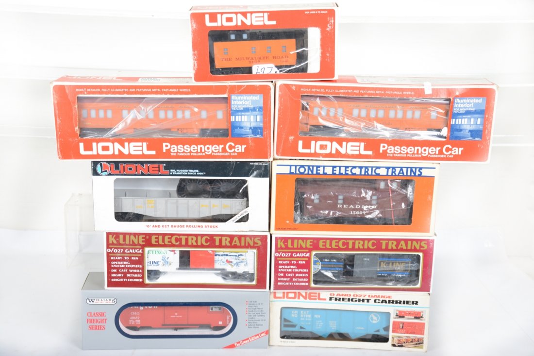 Modern Rolling Stock Lot: Includes Lionel 17607 Reading smoke caboose; 9011 GN hopper; 6169 MR caboose; 16328 NPR reel car; 9505 MR coach; 9504 MR coach; K-Line 900043 KCC Christmas car; 90001 KCC boxcar; Williams 44 Burlingto