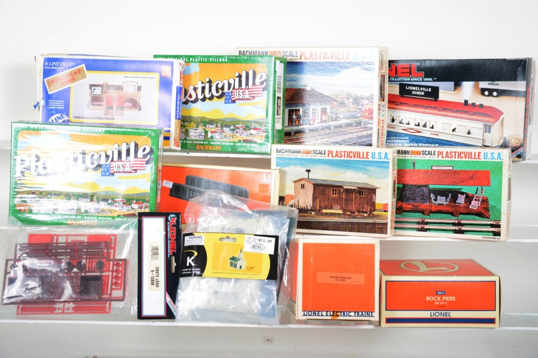 Modern Accessories: Includes Lionel 12720 beacon; 12722 smoking diner; 22907 cast girder bridge; 12744 rock piers; K-Lionel 1238 crate load; 21387 church kit; 6 assorted Plasticville style kits. All appear like new with 
