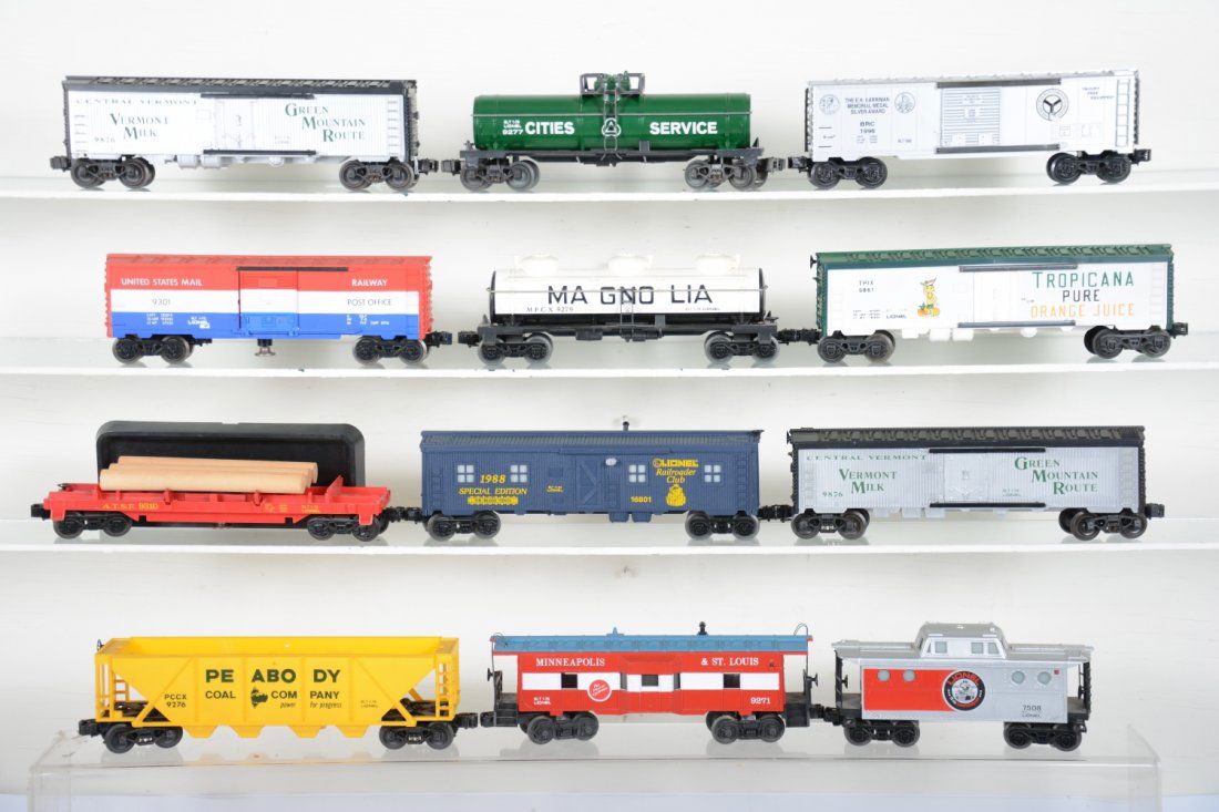 Lionel Modern Freight Cars: Includes 9271 M&StL caboose; 9861 Tropicana reefer; 9301 USPS boxcar, no bag; 9310 SF log dump, complete; 9277 CS tank; 2 #9876 Vermont reefers; 16801 LRRC bunk car; 7508 75th Anniv caboose; 9276 Peab