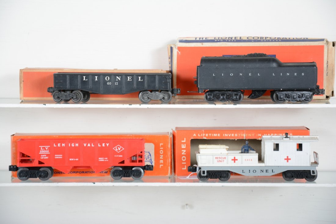 Boxed Lionel Freight Cars: Includes a 6814 rescue caboose, original accessories, 2 stretcher broken handles, man loose, C6+; 6012 gondola; 2671W LL tender(for 1950 736 Berk); 6476 hopper. Rest show light playwear with boxes, C7