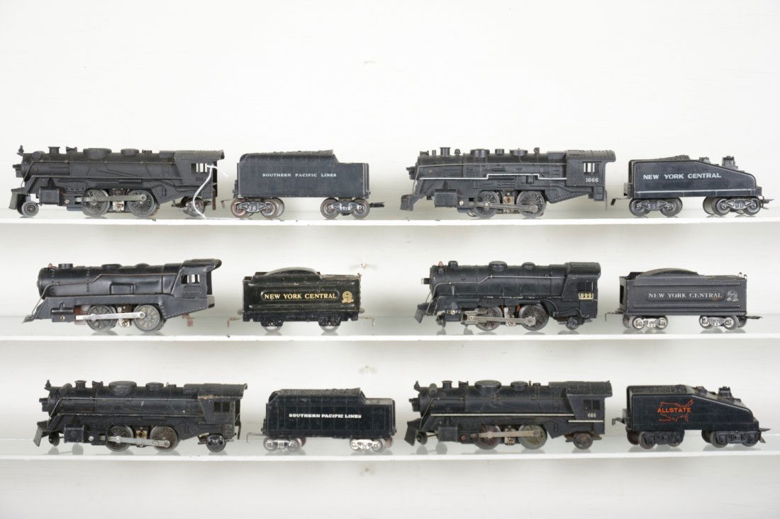 Marx Steam Locomotive Lot: Includes 999 loco with NYC wedge tender; 1666 loco with NYC slant tender; 666 cast loco with SP C-truck tender; 397 loco with NYC wedge tender; 666 cast loco with SP 3/16 tender; 1666 with Alstate sla