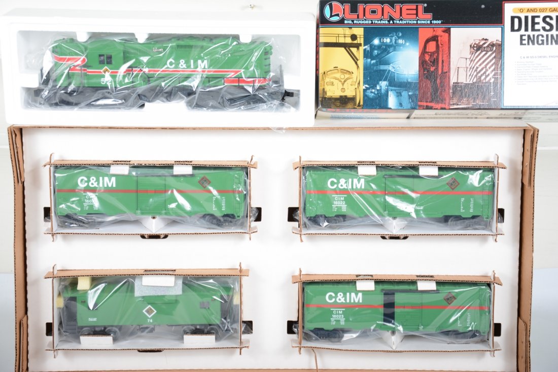 Scarce Lionel 18823 & 18556 C&MI Train Set: This was a very limited sears Promotional set in 1992. It includes an SD9 diesel with the 4 matching Freight cars. We have only seen a few of these. This example is new in boxes, C10