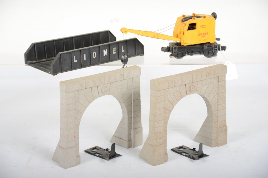 Lionel 3650, 920 & 214: Includes a 3360 Burro crane, hairline screw crack, but has its hook and both track trips; 920 tunnel portals; 214 girder bridge. All show moderate playwear, C6-7