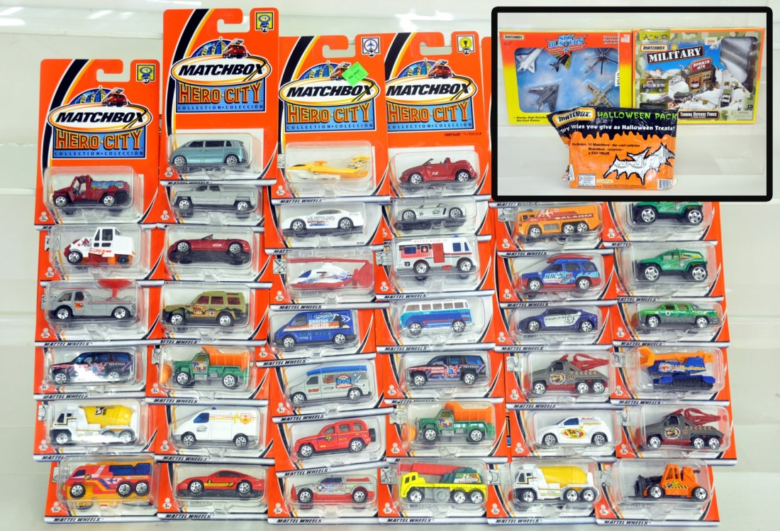 70+ Matchbox Superfast Vehicles: Includes 40 Matchbox Hero City Vehicles, 2002 issues; Plus unusual multi-packs with a 1999 Halloween 10pk; 1998 Tundra Defense Force 17pc set; 1995 Sky Busters 5pk. All are factory sealed in packaging