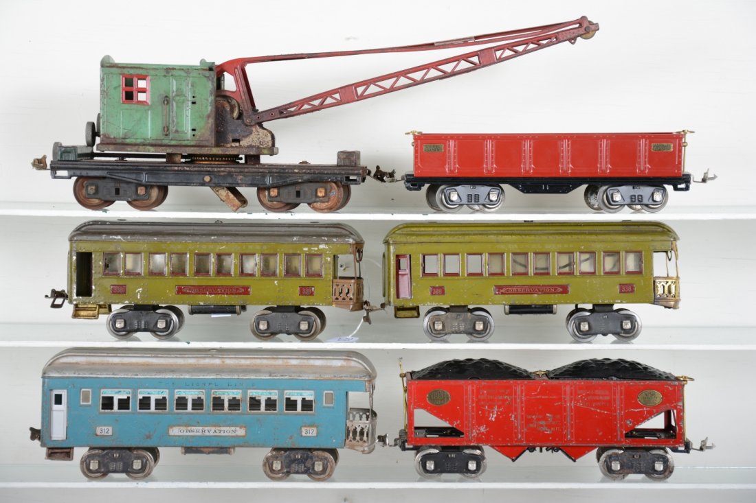 Lionel Standard Gauge Cars: Includes a 219 derrick, missing roof; 512 gondola restored; 338 observation olive sides, gray roof; 516 coal train hopper, missing 1 brake wheel top; 312 observation, roof dirty; 338 observation, maro