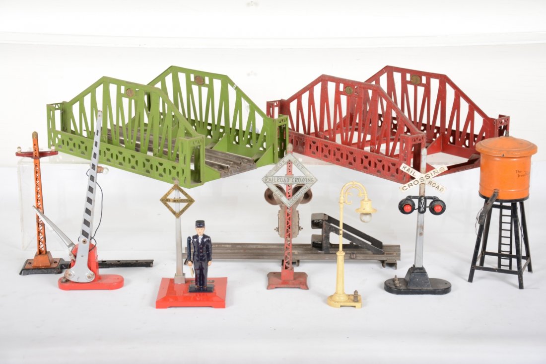 Pre War Lionel & Ives Accessories: Includes an Lionel 69 ringing signal; 154 flasher; 85 telegraph pole, C4; Ives 90 water tank, missing counter weight; Lionel 58 lamppost; 1045 flagman; 2 #280 girder bridges, ST Ga.; 23 bumper; 152 cr