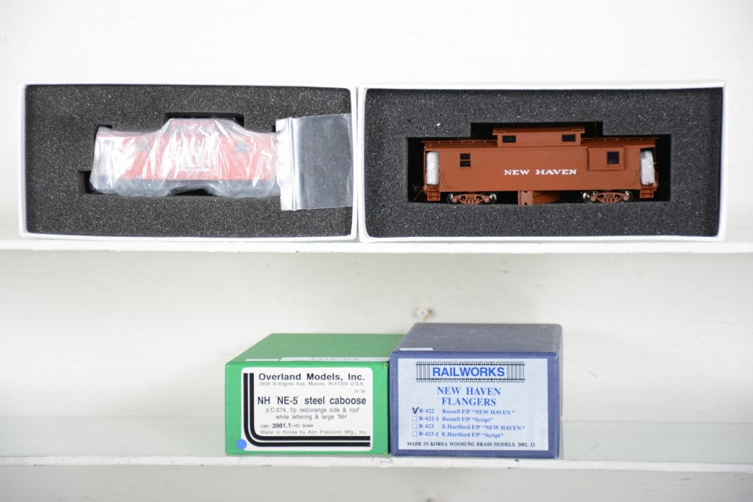 2 Brass NH Cabooses: Both Factory painted. Includes Rail Works Flangers R-422; Overland NE-5 #C-574. HO Gauge. Like New to Mint, unrun, may have minor dust from display, near perfect paint, may have some tarnishing to fin