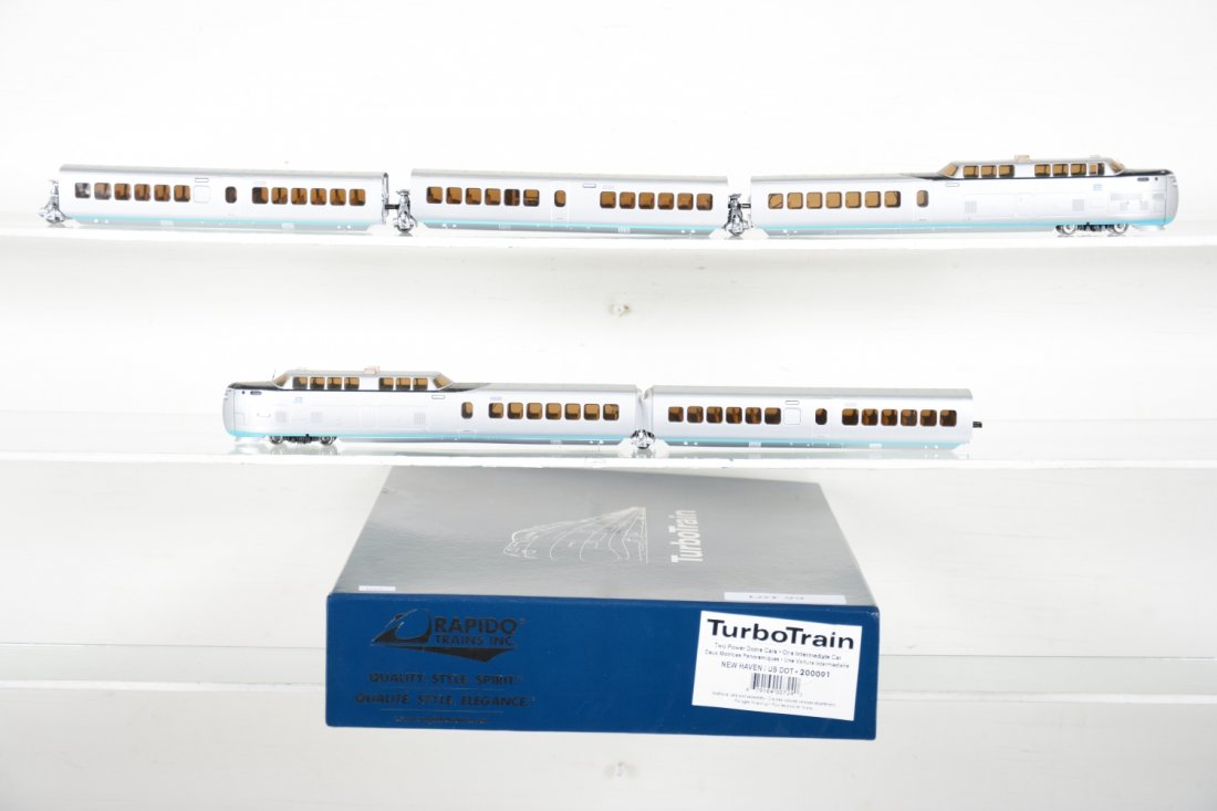 Rapido HO NH 200001 Turbo Train: Equipped with DCC. 2 powered cars with coach, plus 2 additional coaches, set box, add-on cars loose, C9