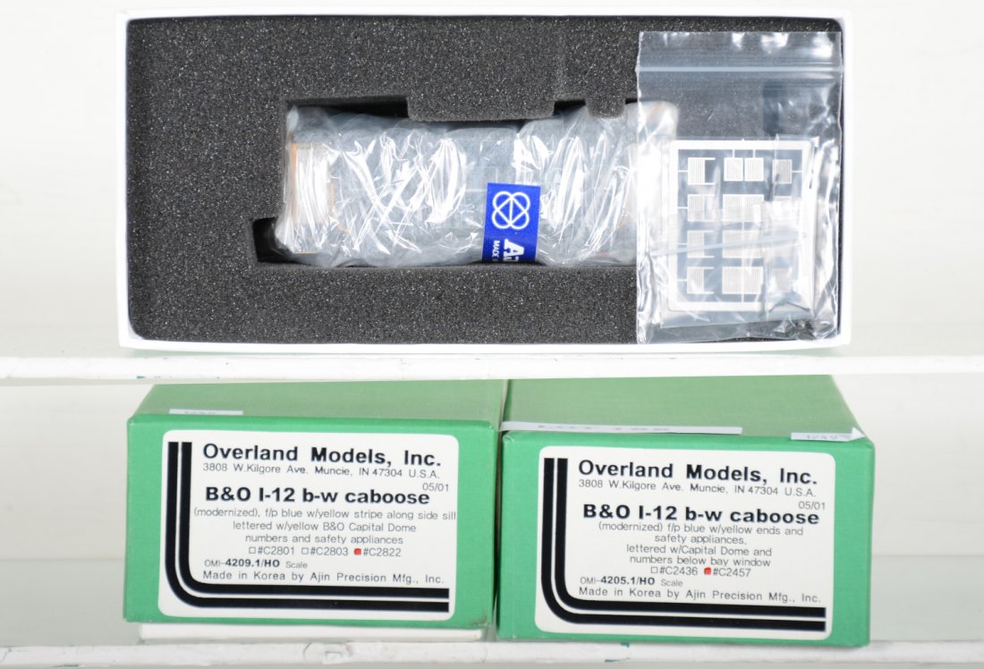 2 Overland Brass B&O 15ba Bay Window Cabooses: 1 marked C2822 other #C2457 black versions. HO Gauge. Like New to Mint, unrun, may have minor dust from display, near perfect paint, may have some tarnishing to finish. Original box, C10