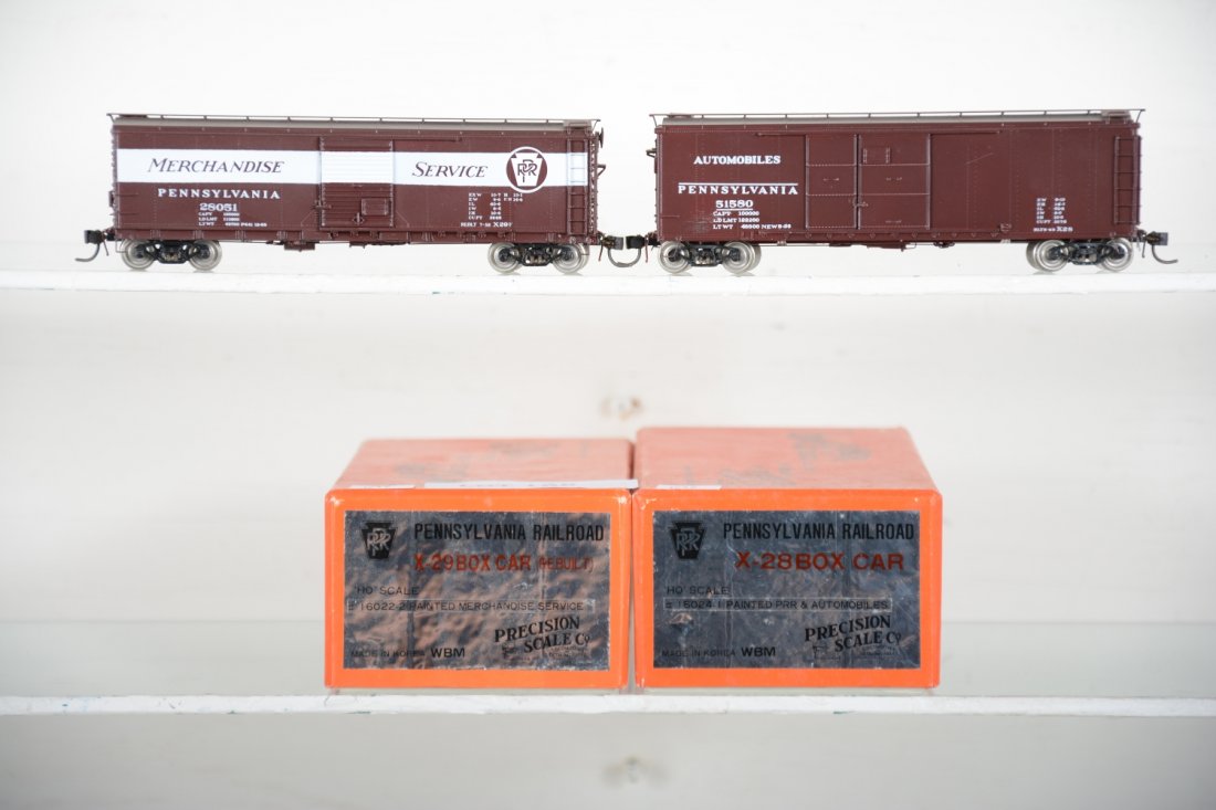 2 Precision Scale Brass PRR Steel Boxcars: Includes X-29 Merchandise service; X-28 Automobiles. Both Factory painted. HO Gauge. Like New to Mint, unrun, may have minor dust from display, near perfect paint, may have some tarnishing to finish. 