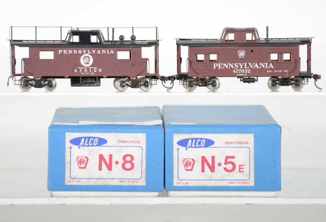 2 Alco Brass PRR Cabooses: Includes an N-8 #478120 & an N-5E #477032. Both nicely painted & decaled. HO Gauge. Like New, test or very light signs of operation, may have light dust from display, light signs of handling, may have