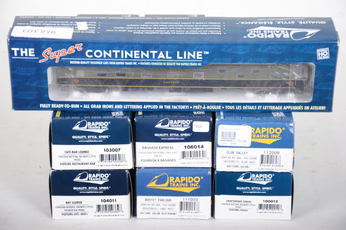 7 Rapido HO CN Passenger Cars: Includes baggage, club, diner, duplex, restaurant-bar, coach & Bay. All appear new in boxes, C10