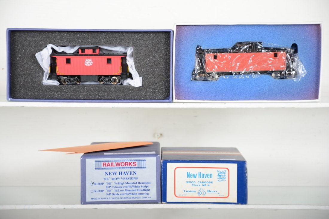 2 Brass HO NH Cabooses: Includes a Custom Brass NE-4Factory painted, unlettered; Rail Works NE MOW high headlight, Factory painted. HO Gauge. Like New to Mint, unrun, may have minor dust from display, near perfect paint, may