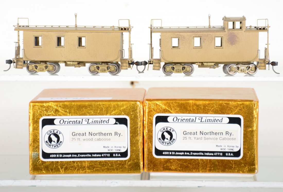 2 Oriental/WooYang GN Wood Cabooses: Includes a 25ft wood side & 25ft wood side yard caboose. HO Gauge. Like New to Mint, unrun, may have minor dust from display, near perfect paint, may have some tarnishing to finish. Original box, C10