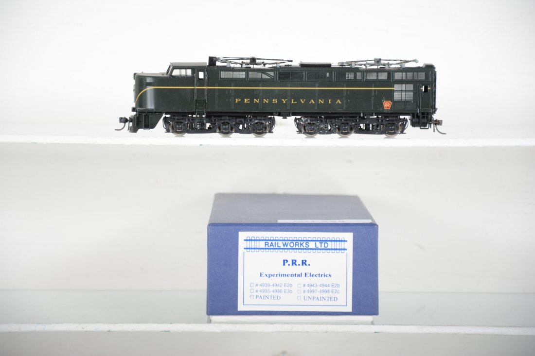 Rail Works Brass PRR Experimental Electric: Factory painted, some corrosion on 1 pantograph, otherwise HO Gauge. Like New to Mint, unrun, may have minor dust from display, near perfect paint, may have some tarnishing to finish. Original box, C1
