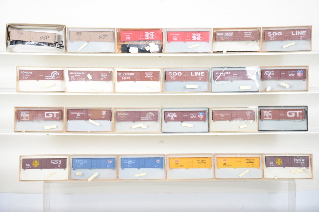 12 Pairs TMI HO Plug-Door Steel Boxcar Kits: Includes 2 each of 12 road names, for a total of 24 cars, all new in plastic display boxes, C10