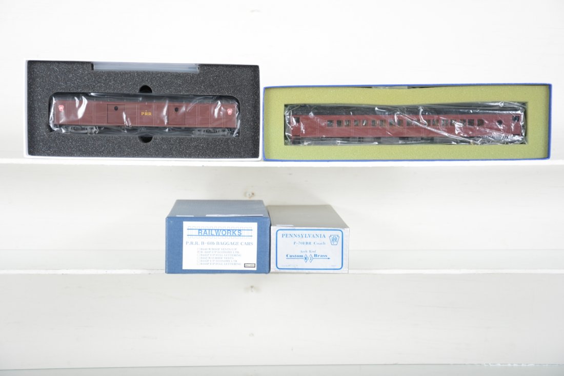 2 Brass HO PRR Passenger Cars: Includes a Rail Works B-60b Baggage, Factory painted; Custom Brass P-70BR Arch Roof coach, Factory painted not lettered. Both HO Gauge. Like New to Mint, unrun, may have minor dust from display, near
