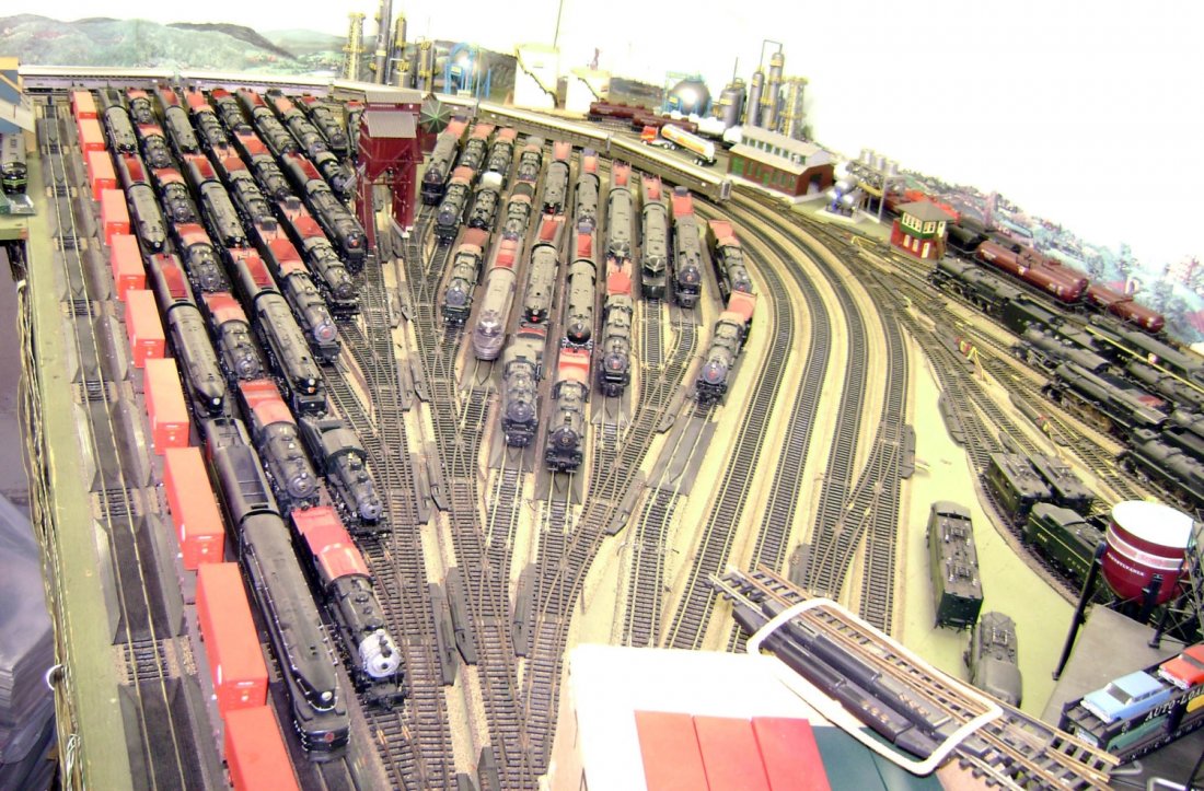 Large Pelhem, NY 2-Rail HO Layout: If switch yards are your love, this is the layout for you. It is shaped like a sink trap pipe with the long side at 16 feet. All the track is American and all attached and wired to the platform. The t