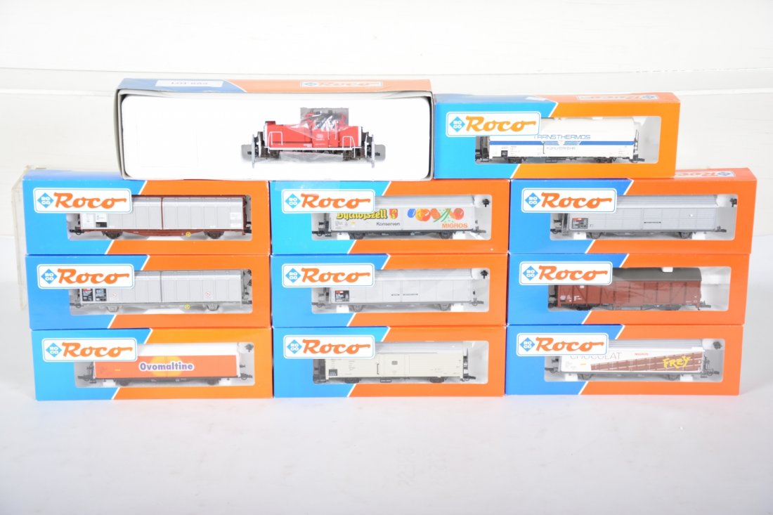 ROCO HO Diesel Freight Set: 2-Rail. Includes a 43622 BR 361 DB diesel with 10 17cm assorted 4-wheel freight cars. All appear new in boxes, C10