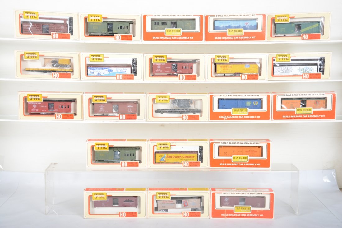 20+ Assorted TMI HO Freight Car Kits: Assorted road names, and car styles with flat cars, cabooses, boxcars, reefers, tool cars and more, all new in cellophane window boxes, C10