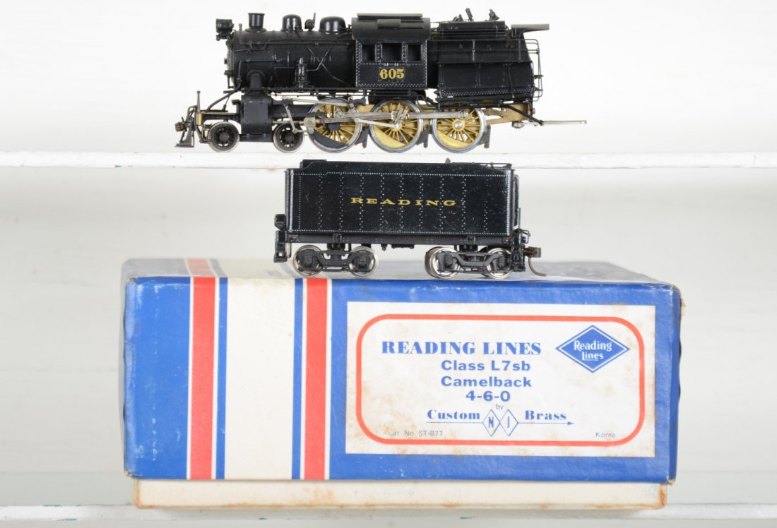 Custom Brass HO Reading L-7sb Camelback 4-6-0: Cab 605. painted & decaled. Otherwise, Excellent, Light to moderate run-time, Signs of handling, Very minor paint flaws, may have minor decal wear, but presentable. Dusty from display with original bo