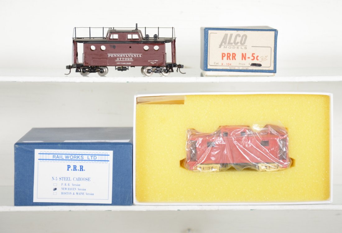 2 Brass HO Cabooses: Includes a Railworks N-5 steel caboose, Factory painted NH version, new in box, C10; Alco N-5c painted & decaled, ob, C7