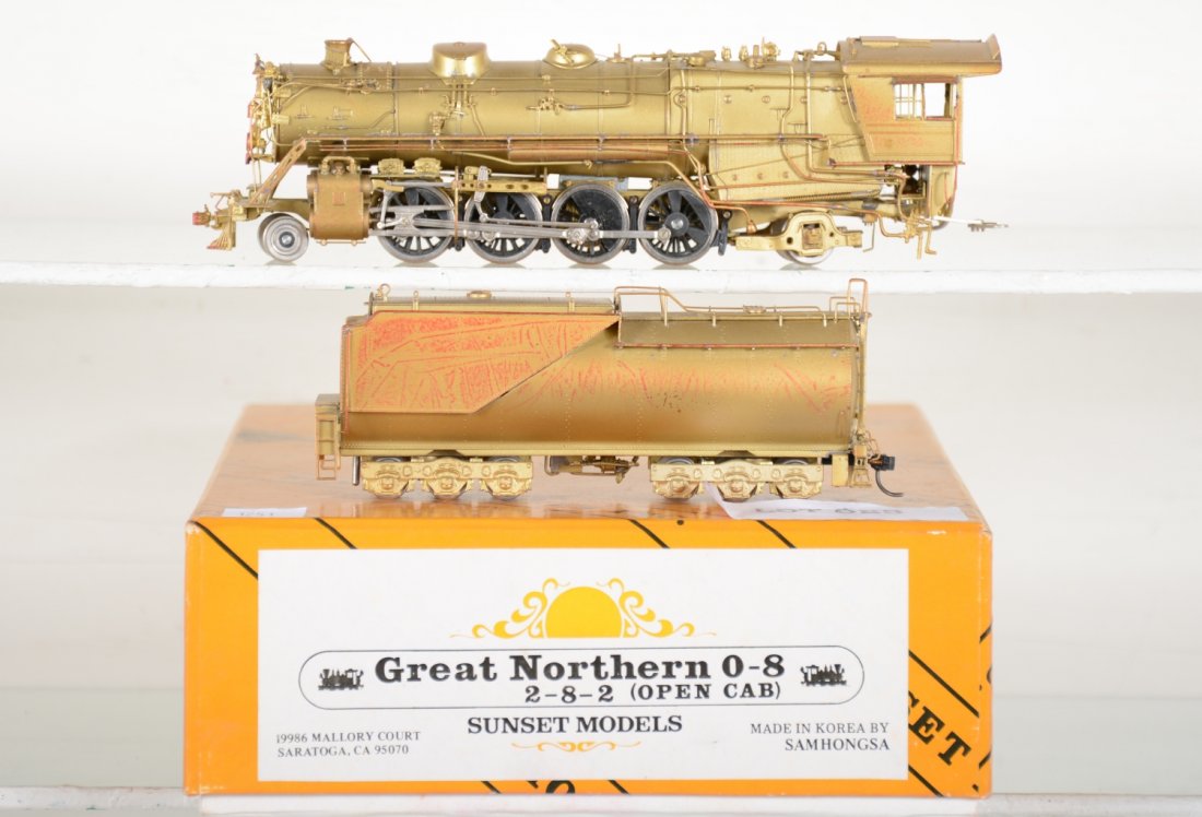 Sunset/ Samhongsa Brass HO GN O-8 2-8-2 Open Cab: Worn foam insert. Like New to Mint, unrun, may have minor dust from display, nice finish, but has some red from foam, may have some tarnishing to finish. Original box, otherwise C9 Vintage brass train
