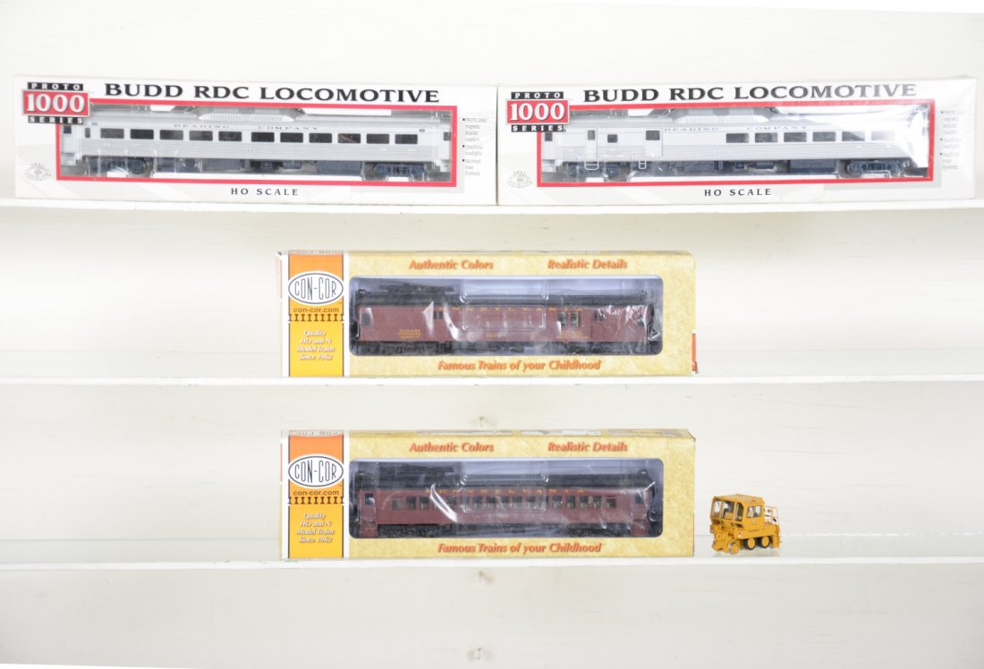 HO Gauge Light Traction Lot: Includes a Broadway Ltd Trackmobile, no box; Con-Cor powered PRR MU coach & Baggage electrics; Life-Like Proto 1000 Reading Budd powered baggage #9163 & powered coach #9166. All show test track runtim