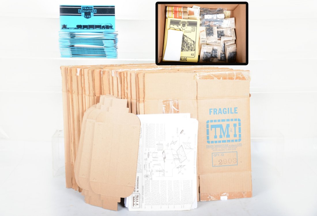 Train Miniatures Peripheral Collector items: Includes several examples of packaging, some mint unused, spray paint and separate sale parts for a peg display, plus scarce catalogs and paper. For the completist!